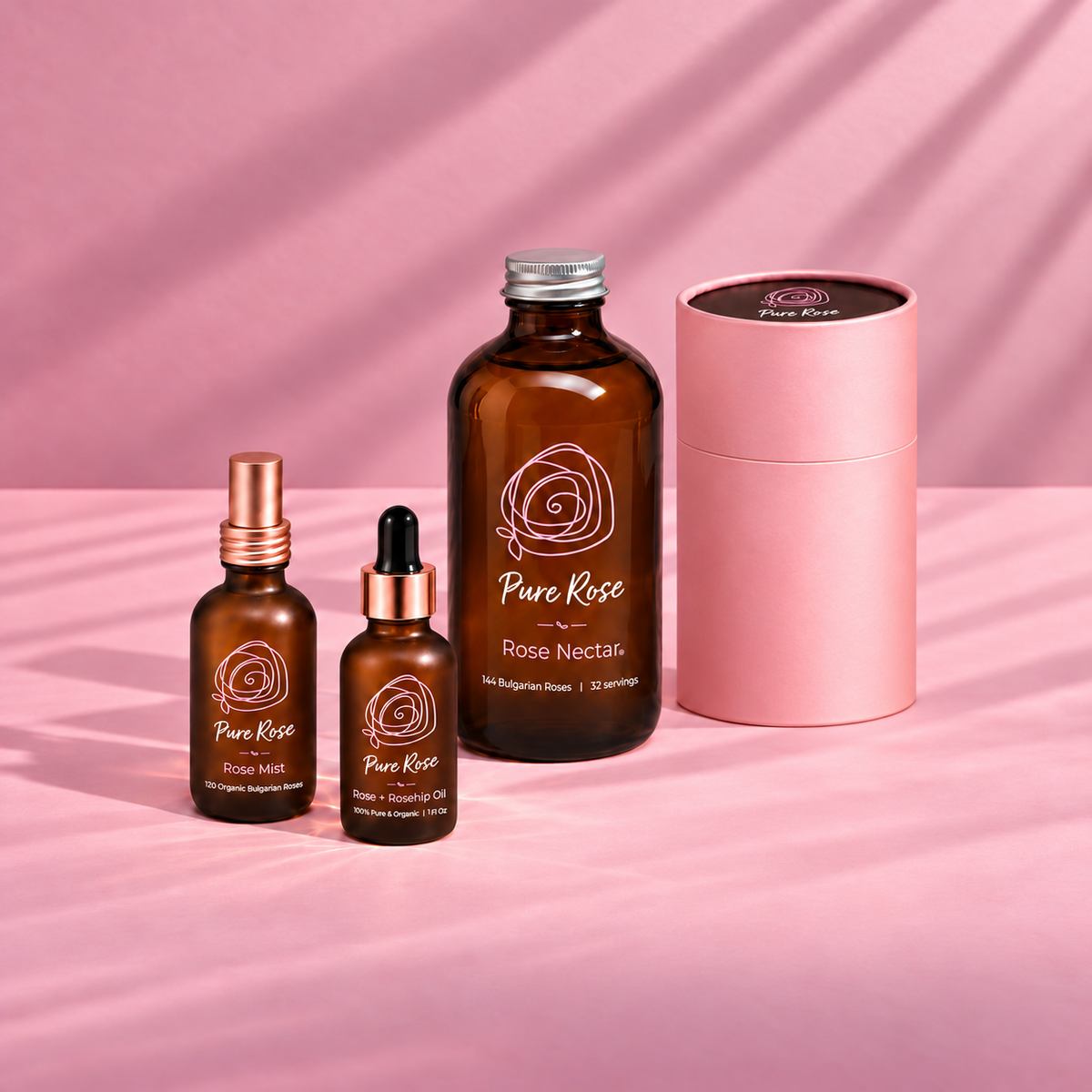 Look-Good Ritual: Rose Mist, Rose + Rosehip Oil and Rose Nectar on a sunlit pink set