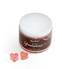 Rose Yummies jar with two coral heart gummies